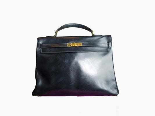 Lysis vintage Hermès Kelly 35 black & gold - 1980s
